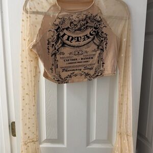 Fashion Nova Tan Graphic Crop Top with Sheer Sleeves